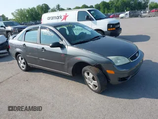 2007 Ford Focus S z VIN 1FAFP34N87W229682, wystawiony jako IAAI lot #42393649 z przebiegiem 190 804 mil mil oraz . Historia ofert i sprzedaży dostępna na DreamBid. Obrazek 1.