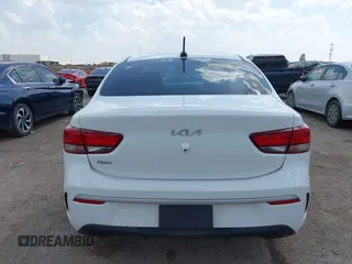 2023 Kia Rio S z VIN 3KPA24AD7PE550899, wystawiony jako IAAI lot #41882407 z przebiegiem 24 966 mil mil oraz . Historia ofert i sprzedaży dostępna na DreamBid. Obrazek 16.