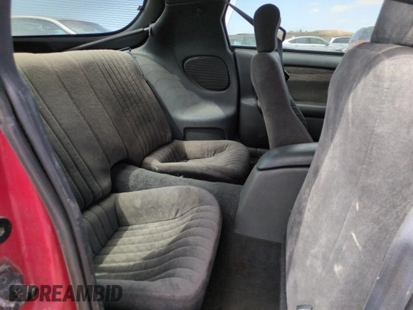 1995 Pontiac Firebird Firebird z VIN 2G2FS22S5S2227060, wystawiony jako Copart lot #64597545 z przebiegiem 106 971 mil mil oraz Szkoda całkowita • Salvage title. Historia ofert i sprzedaży dostępna na DreamBid. Obrazek 10.
