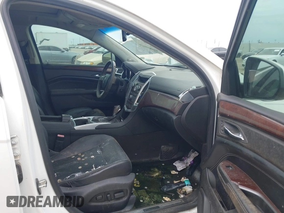 2012 Cadillac SRX Premium Collection with VIN 3GYFNCE32CS579256, listed as a IAAI auction lot 42660666 with 125,236 mi miles and . Bid and sale history available at DreamBid. Image 5.