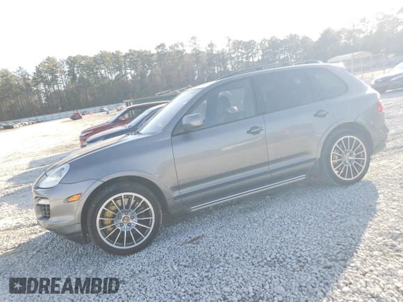 2009 Porsche Cayenne Turbo with VIN WP1AC29P79LA81564, listed as a Copart auction lot 43852815 with 71,760 mi miles and Salvage Title. Bid and sale history available at carsss.com. Image 1.