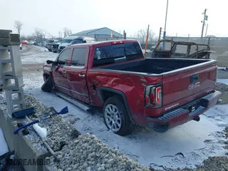 2018 GMC Sierra 1500 Denali with VIN 3GTU2PEC2JG513576, listed as a IAAI auction lot 41349059 with 167,209 mi miles. Bid and sale history available at carsss.com. Image 3.