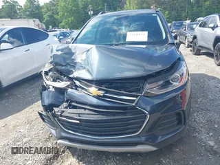 2021 Chevrolet Trax LT with VIN KL7CJLSB7MB325696, listed as a IAAI auction lot 42244114 with Not provided miles and . Bid and sale history available at DreamBid. Image 12.