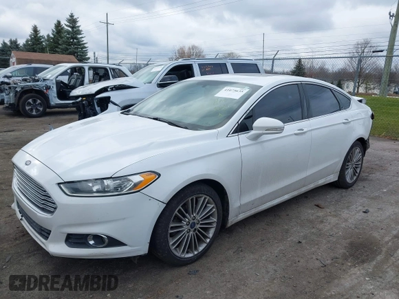 2015 Ford Fusion SE with VIN 3FA6P0H9XFR181132, listed as a IAAI auction lot 41075635 with 216,089 mi miles and . Bid and sale history available at DreamBid. Image 2.