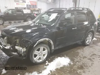 2009 Subaru Forester X with VIN JF2SH63629H743523, listed as a IAAI auction lot 41925173 with 196,469 mi miles and . Bid and sale history available at DreamBid. Image 2.