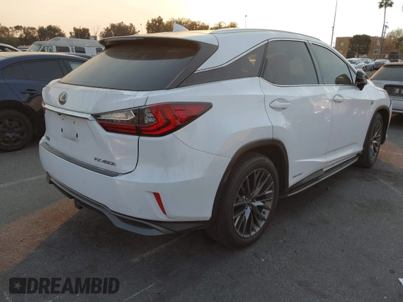 2019 Lexus RX with VIN 2T2BGMCAXKC036573, listed as a IAAI auction lot 41299079 with 104,568 mi miles. Bid and sale history available at carsss.com. Image 4.