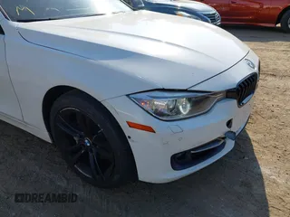 2013 BMW 3 Series 335i xDrive with VIN WBA3B9C54DF587421, listed as a IAAI auction lot 42165857 with 142,331 mi miles. Bid and sale history available at carsss.com. Image 6.