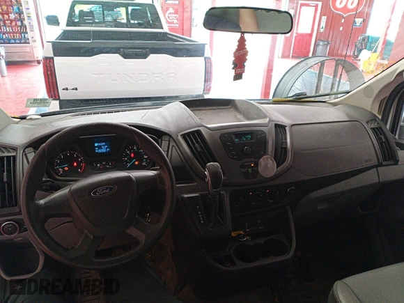 2015 Ford Transit Cargo with VIN 1FTNE1YM4FKA87516, listed as a IAAI auction lot 42901216 with 269,921 mi miles and . Bid and sale history available at DreamBid. Image 30.