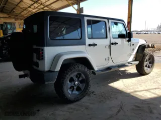 2018 Jeep Wrangler JK Unlimited Sahara with VIN 1C4HJWEG8JL938031, listed as a Copart auction lot 69769394 with 80,417 mi miles and Salvage Title. Bid and sale history available at carsss.com. Image 3.