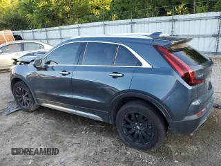 2019 Cadillac XT4 FWD Premium Luxury z VIN 1GYFZCR47KF123621, wystawiony jako Copart lot #69766894 z przebiegiem 68 191 mil mil oraz Szkody całkowita. Historia ofert i sprzedaży dostępna na DreamBid. Obrazek 2.