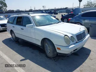 1999 Mercedes-Benz E-Class with VIN WDBJH65F7XA787254, listed as a IAAI auction lot 41884002 with 1 mi miles. Bid and sale history available at carsss.com. Image 1.