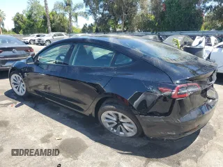 2023 Tesla Model 3 с VIN 5YJ3E1EA7PF458510, выставлен на аукционе Copart как лот 63921795 с пробегом 70 726 миль миль и Списание • Salvage title. История ставок и продаж доступна на DreamBid. Изображение 2.