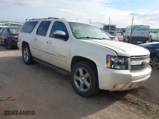 2012 Chevrolet Suburban LTZ with VIN 1GNSKKE71CR251475, listed as a IAAI auction lot 41276204 with 241,316 mi miles. Bid and sale history available at carsss.com. Image 1.