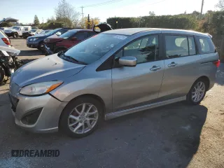 2012 Mazda Mazda5 Grand Touring with VIN JM1CW2DL2C0140051, listed as a Copart auction lot 84113114 with 112,993 mi miles and Salvage Title. Bid and sale history available at carsss.com. Image 1.