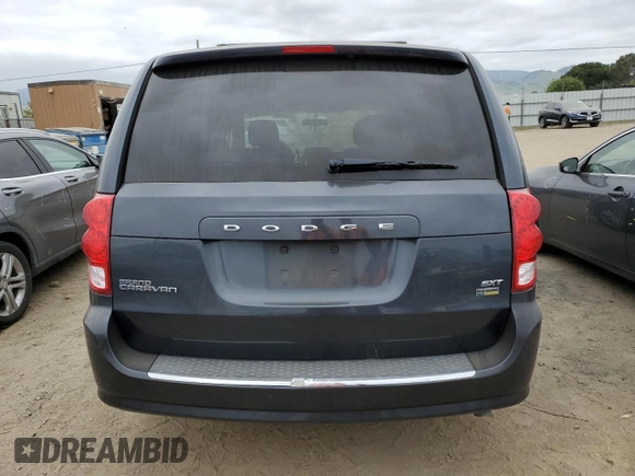 2014 Dodge Grand Caravan SXT with VIN 2C4RDGCG5ER267354, listed as a Copart auction lot 54548955 with 145,971 mi miles and Clean Title. Bid and sale history available at DreamBid. Image 6.