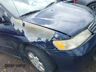 2004 Honda Odyssey EX-L with VIN 5FNRL189X4B045588, listed as a IAAI auction lot 41928397 with 218,182 mi miles and . Bid and sale history available at DreamBid. Image 6.