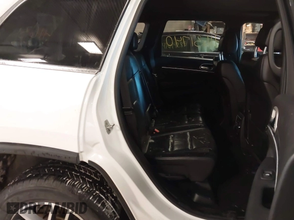 2021 Jeep Grand Cherokee 80th Anniversary with VIN 1C4RJFBG7MC611827, listed as a IAAI auction lot 41631740 with 85,253 mi miles and . Bid and sale history available at DreamBid. Image 8.