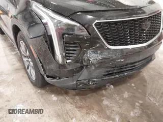 2020 Cadillac XT4 AWD Sport with VIN 1GYFZFR43LF090264, listed as a IAAI auction lot 41261586 with 65,859 mi miles and . Bid and sale history available at DreamBid. Image 6.