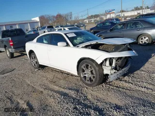 2016 Dodge Charger SXT with VIN 2C3CDXJG4GH259669, listed as a IAAI auction lot 41805408 with 207,187 mi miles. Bid and sale history available at carsss.com. Image 1.
