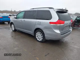 2012 Toyota Sienna LE with VIN 5TDJK3DCXCS040253, listed as a IAAI auction lot 41957623 with 164,780 mi miles. Bid and sale history available at carsss.com. Image 3.