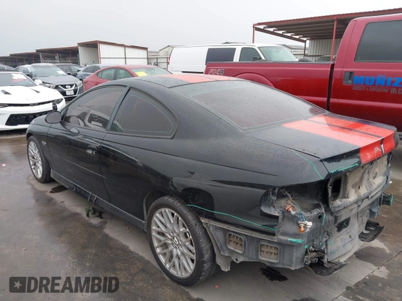 2004 Pontiac GTO z VIN 6G2VX12G84L183838, wystawiony jako IAAI lot #41946144 z przebiegiem 134 718 mil mil oraz . Historia ofert i sprzedaży dostępna na DreamBid. Obrazek 3.