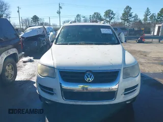 2008 Volkswagen Touareg V6 with VIN WVGBE77L48D033523, listed as a IAAI auction lot 41076281 with 202,286 mi miles and . Bid and sale history available at DreamBid. Image 6.