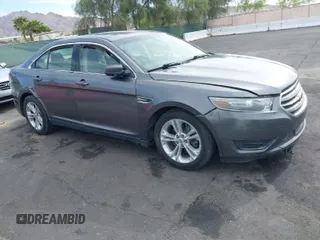 2013 Ford Taurus SEL with VIN 1FAHP2E82DG230831, listed as a IAAI auction lot 42078978 with 207,075 mi miles and . Bid and sale history available at carsss.com. Image 1.