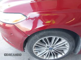 2013 Ford Fusion SE Hybrid z VIN 3FA6P0LU9DR183625, wystawiony jako IAAI lot #42338533 z przebiegiem 159 546 mil mil oraz . Historia ofert i sprzedaży dostępna na DreamBid. Obrazek 12.