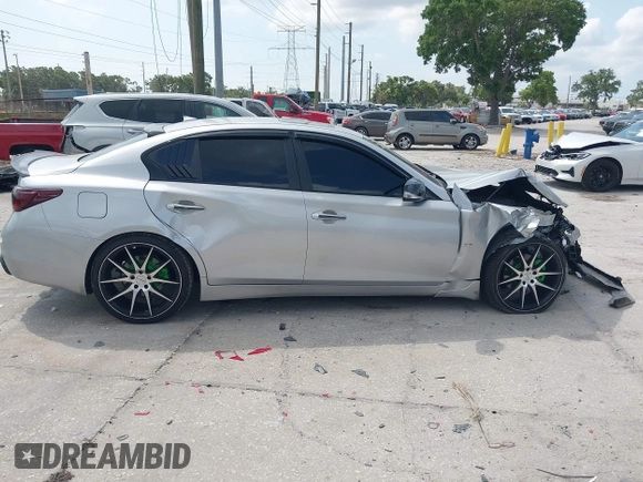2014 Infiniti Q50 Sport с VIN JN1BV7ARXEM694019, выставлен на аукционе IAAI как лот 42182390 с пробегом 65 904 миль миль и . История ставок и продаж доступна на DreamBid. Изображение 13.
