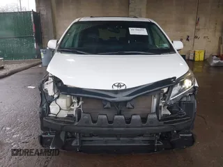 2015 Toyota Sienna SE with VIN 5TDXK3DC1FS528070, listed as a IAAI auction lot 41780191 with 117,488 mi miles. Bid and sale history available at carsss.com. Image 13.