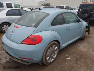 2012 Volkswagen Beetle 2.5L PZEV with VIN 3VWJP7AT0CM624851, listed as a IAAI auction lot 41364230 with 1 mi miles. Bid and sale history available at carsss.com. Image 4.