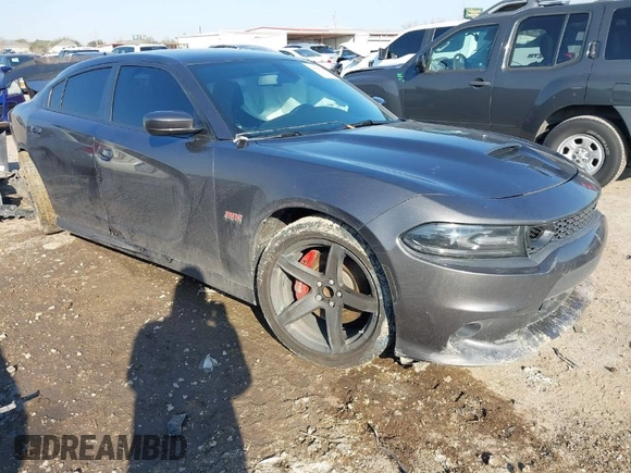 2021 Dodge Charger Scat Pack with VIN 2C3CDXGJ9MH511348, listed as a IAAI auction lot 41688349 with 56,425 mi miles and . Bid and sale history available at DreamBid. Image 1.