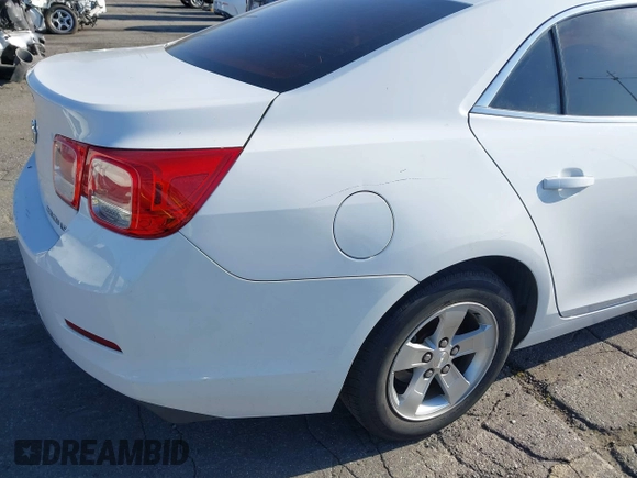 2014 Chevrolet Malibu LS with VIN 1G11A5SL0EF265309, listed as a IAAI auction lot 41998283 with 128,999 mi miles and . Bid and sale history available at DreamBid. Image 13.