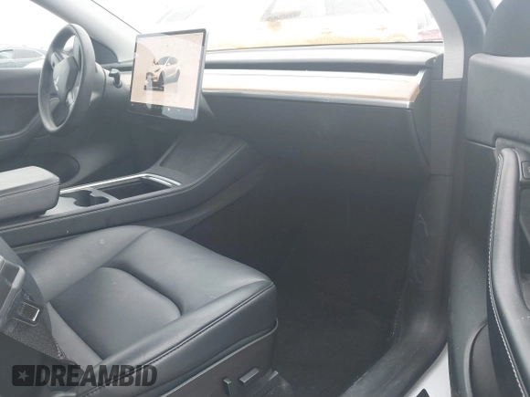 2022 Tesla Model Y Performance with VIN 7SAYGDEF0NF400560, listed as a IAAI auction lot 41783912 with 36,513 mi miles and . Bid and sale history available at DreamBid. Image 5.