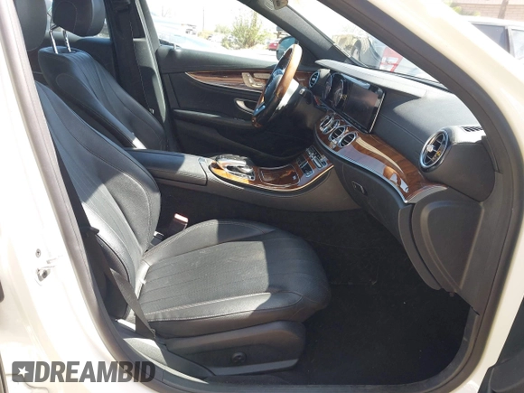 2019 Mercedes-Benz E-Class E 300 with VIN WDDZF4JBXKA597397, listed as a IAAI auction lot 41724672 with 99,258 mi miles. Bid and sale history available at carsss.com. Image 5.