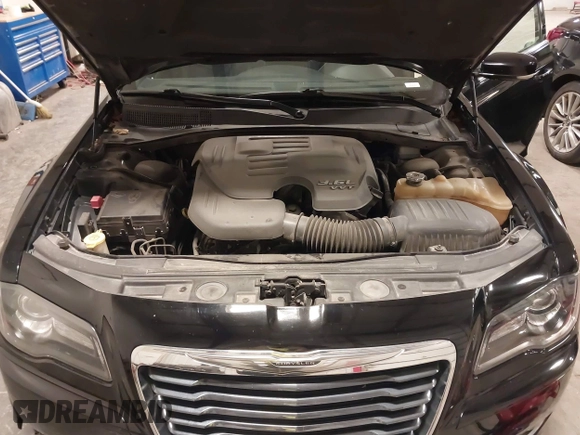 2013 Chrysler 300 with VIN 2C3CCABG1DH548616, listed as a IAAI auction lot 41376584 with 122,369 mi miles. Bid and sale history available at carsss.com. Image 10.