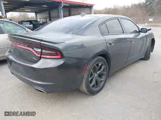 2018 Dodge Charger R/T with VIN 2C3CDXCT0JH331498, listed as a IAAI auction lot 41477060 with 129,116 mi miles. Bid and sale history available at carsss.com. Image 4.