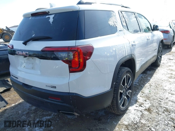 2021 GMC Acadia SLT with VIN 1GKKNMLS2MZ163379, listed as a IAAI auction lot 41614025 with 61,232 mi miles. Bid and sale history available at carsss.com. Image 4.