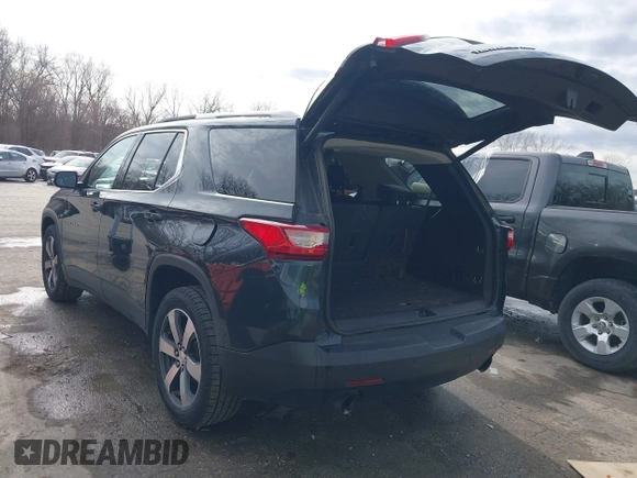 2018 Chevrolet Traverse LT Leather with VIN 1GNEVHKW0JJ113344, listed as a IAAI auction lot 41105083 with 95,855 mi miles. Bid and sale history available at carsss.com. Image 3.