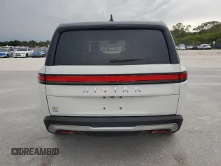 2023 Rivian R1S Adventure z VIN 7PDSGABA3PN024458, wystawiony jako Copart lot #74087714 z przebiegiem 3 505 mil mil oraz Nie do naprawy • Non repairable. Historia ofert i sprzedaży dostępna na DreamBid. Obrazek 6.