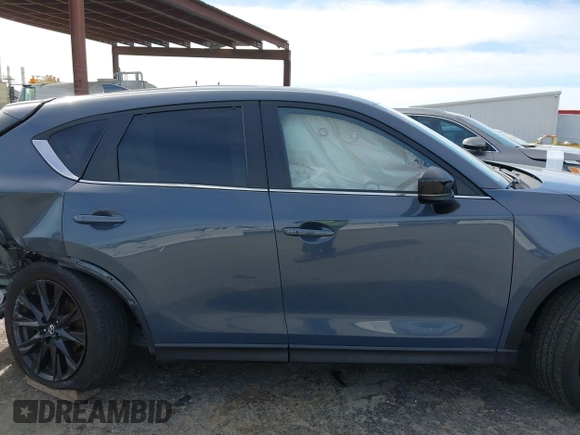 2023 Mazda CX-5 2.5 S Carbon Edition with VIN JM3KFBCM9P0240506, listed as a IAAI auction lot 41583703 with 23,173 mi miles. Bid and sale history available at carsss.com. Image 14.