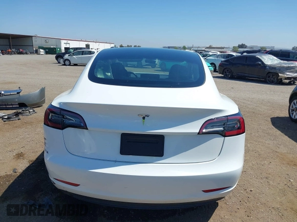 2023 Tesla Model 3 with VIN 5YJ3E1EA2PF571569, listed as a IAAI auction lot 42288715 with 30,271 mi miles and . Bid and sale history available at DreamBid. Image 16.