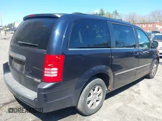 2010 Chrysler Town & Country Touring with VIN 2A4RR5DX1AR267330, listed as a IAAI auction lot 42041615 with 179,171 mi miles. Bid and sale history available at carsss.com. Image 4.