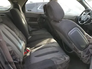 2002 Pontiac Aztek z VIN 3G7DA03E22S584224, wystawiony jako Copart lot #87851655 z przebiegiem 218 653 mil mil oraz Szkoda całkowita • Salvage title. Historia ofert i sprzedaży dostępna na DreamBid. Obrazek 11.