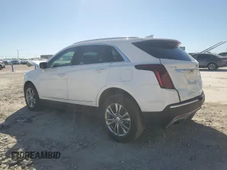 2021 Cadillac XT5 FWD Premium Luxury with VIN 1GYKNCRSXMZ135949, listed as a Copart auction lot 47752805 with 99,838 mi miles and Salvage Title. Bid and sale history available at carsss.com. Image 2.
