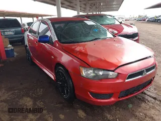 2014 Mitsubishi Lancer ES with VIN JA32U2FU9EU010401, listed as a IAAI auction lot 41809942 with 168,917 mi miles. Bid and sale history available at carsss.com. Image 1.