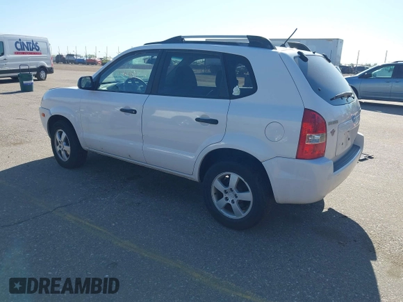 2006 Hyundai Tucson GL with VIN KM8JM72B56U324168, listed as a IAAI auction lot 42146955 with 206,919 mi miles. Bid and sale history available at carsss.com. Image 3.
