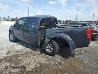 2010 Nissan Frontier Pro-4X with VIN 1N6AD0EV2AC401933, listed as a Copart auction lot 53980575 with 188,170 mi miles and Salvage title. Bid and sale history available at DreamBid. Image 2.