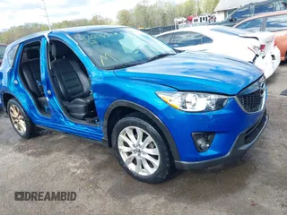2013 Mazda CX-5 Grand Touring with VIN JM3KE4DE4D0123837, listed as a IAAI auction lot 42031074 with 121,818 mi miles. Bid and sale history available at carsss.com. Image 1.