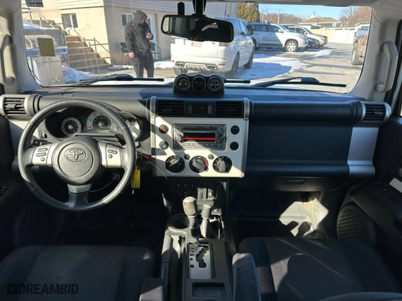 2012 Toyota FJ Cruiser with VIN JTEBU4BF5CK144086, listed as a Copart auction lot 43580065 with 210,801 mi miles and Clean Title. Bid and sale history available at carsss.com. Image 9.